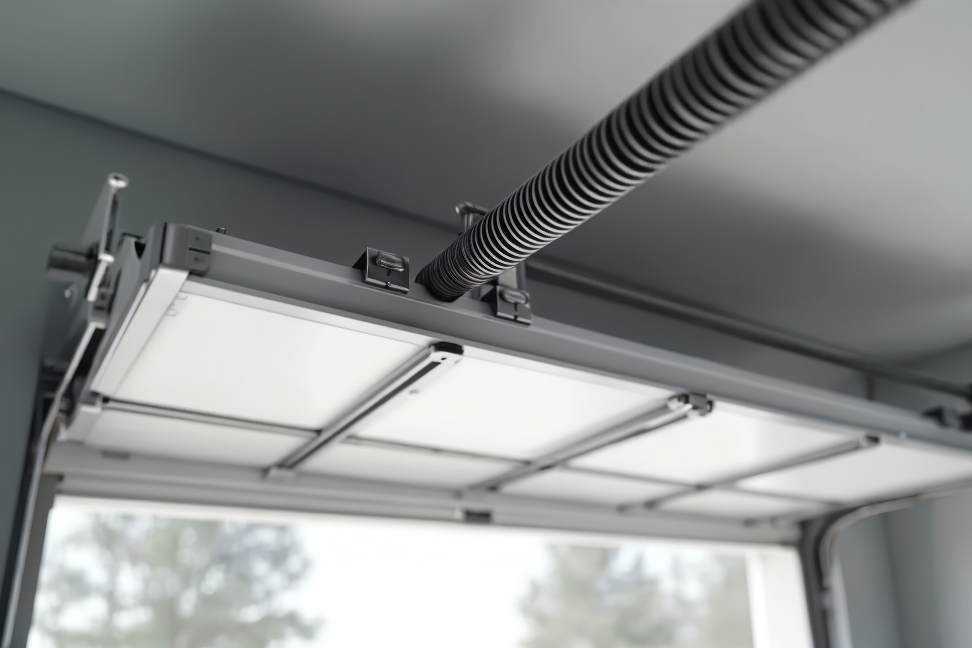 Technician inspecting torsion spring